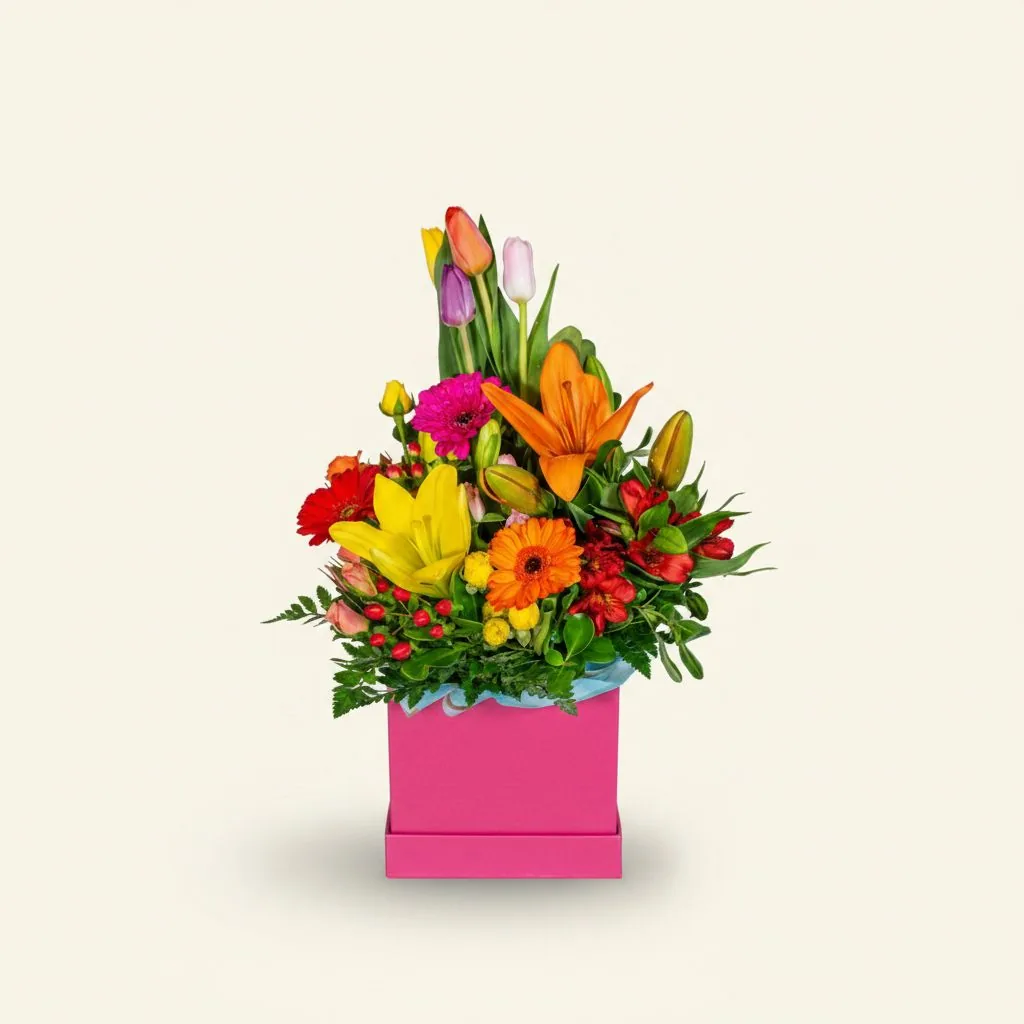 Arreglo Regia en box fucsia con tulipanes · Mely Flor
